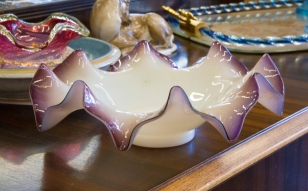 $45 Milky white to amethyst glass flower shaped bowl. U.S.A.