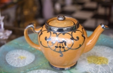 $135. Ohio Pottery Art Nouveau teapot with Sterling silver overlay. U.S.A. Early 1900s.