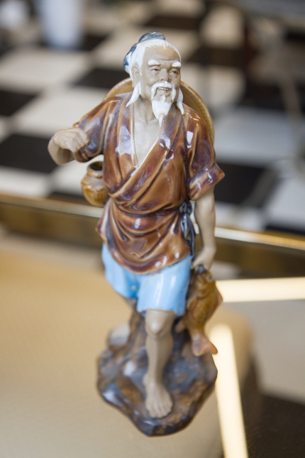 $25 Chinese Shiwan mud man pottery figurine. Fishing pole missing.