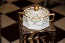 $125 Scarce from 1930, hand decorated Limoges porcelain covered cracker jar.